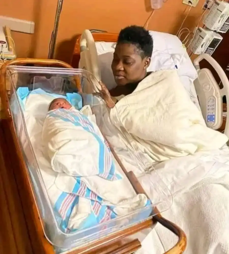 Mercy Johnson and her new born