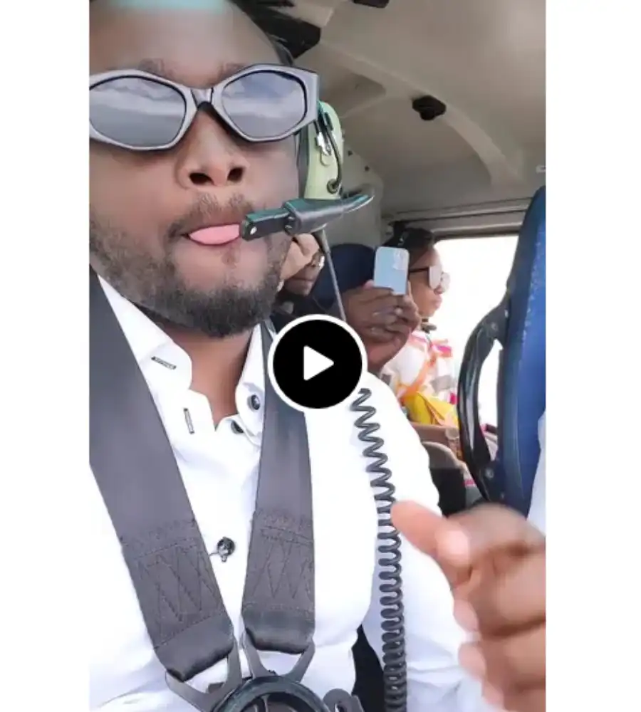 Bahati and his wife, Diana in a helicopter